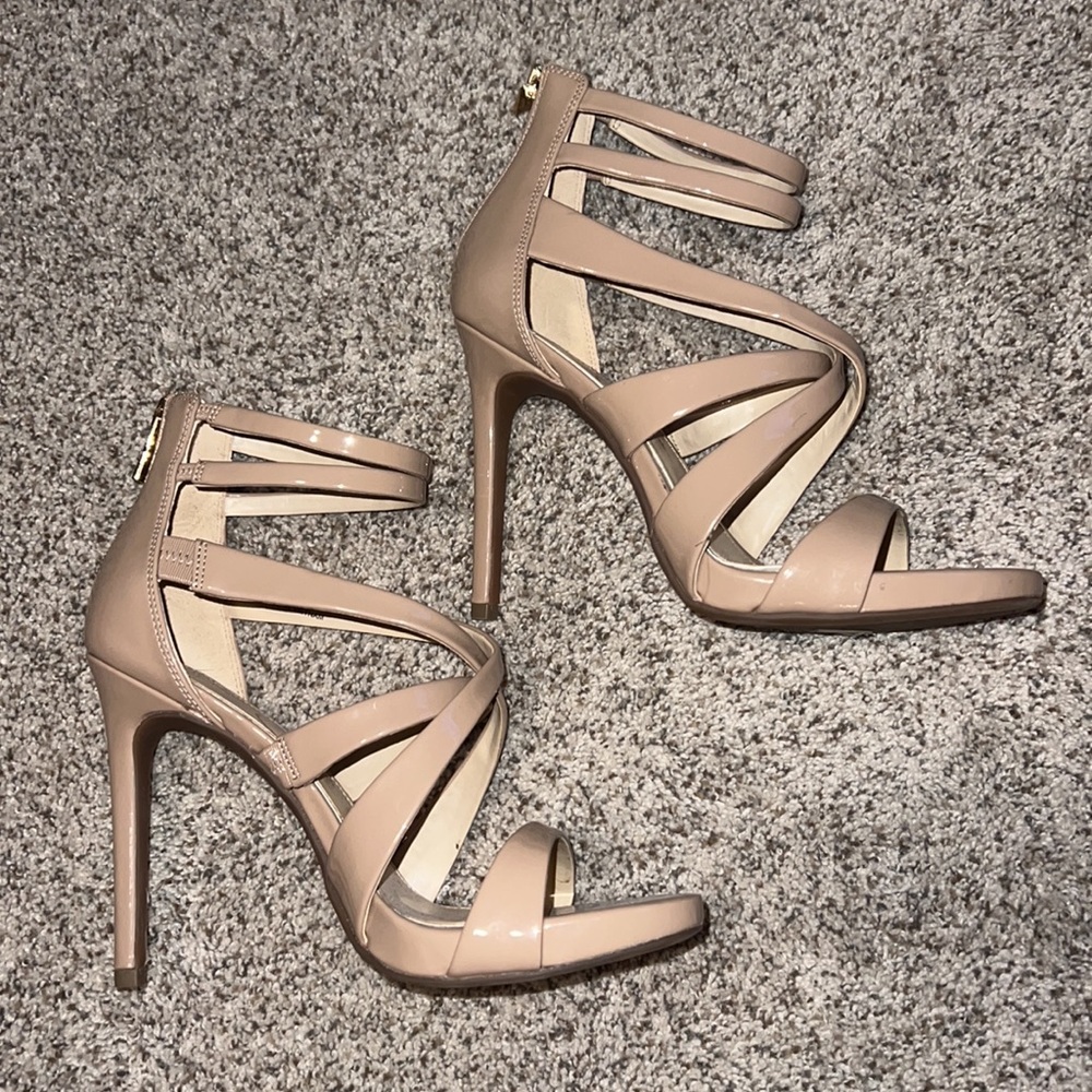 Nude, patent leather strappy heel. Jessica Simpson. Lightly worn.